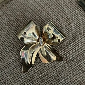 Vintage Unbranded Brooch Pin Metal Bow Tie Gold Tone and Rhinestones
